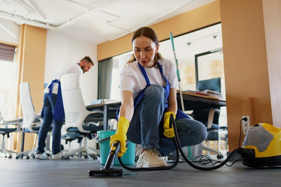 professional cleaning service person using vacuum cleaner office_23 2150520594